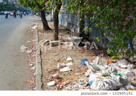 A lot of garbage dumped on the side of the road in Cambodia A lot of garbage dumped on the side of the road in Cambodia 133995141