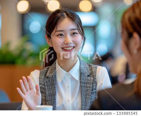 Businesswomen having a meeting in a conference room Businesswomen having a meeting in a conference room 133995545