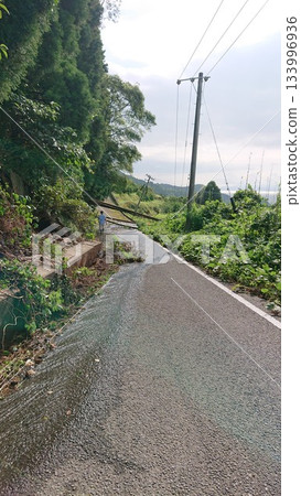 Roads blocked by landslides and fallen trees caused by heavy rain 133996936
