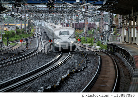 Shinkansen passing through Maibara Station Shinkansen passing through Maibara Station 133997086