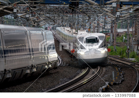 Shinkansen trains crossing at Maibara Station Shinkansen trains crossing at Maibara Station 133997088