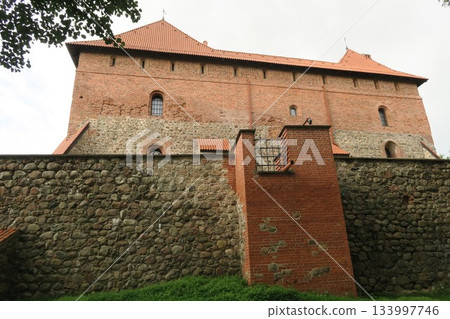 Trakai Castle under restoration on Lake Loukos Trakai Castle under restoration on Lake Loukos 133997746
