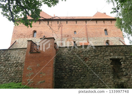 Trakai Castle under restoration on Lake Loukos Trakai Castle under restoration on Lake Loukos 133997748