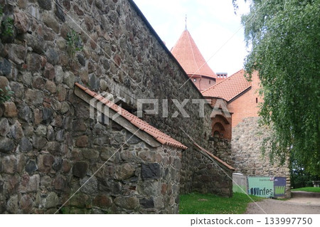 Trakai Castle under restoration on Lake Loukos Trakai Castle under restoration on Lake Loukos 133997750