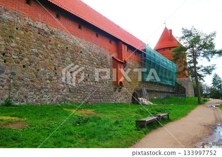 Trakai Castle under restoration on Lake Loukos Trakai Castle under restoration on Lake Loukos 133997752