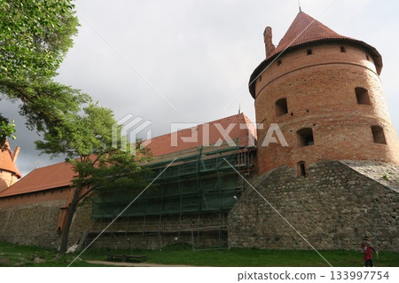 Trakai Castle under restoration on Lake Loukos Trakai Castle under restoration on Lake Loukos 133997754