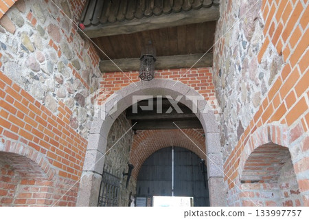 Trakai Castle under restoration on Lake Loukos Trakai Castle under restoration on Lake Loukos 133997757