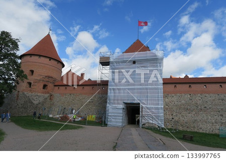 Trakai Castle under restoration on Lake Loukos Trakai Castle under restoration on Lake Loukos 133997765