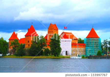 Trakai Castle under restoration on Lake Loukos Trakai Castle under restoration on Lake Loukos 133997767