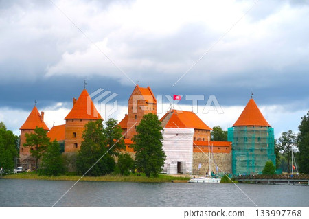 Trakai Castle under restoration on Lake Loukos Trakai Castle under restoration on Lake Loukos 133997768