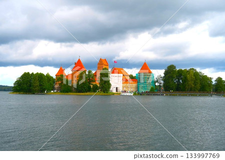 Trakai Castle under restoration on Lake Loukos Trakai Castle under restoration on Lake Loukos 133997769