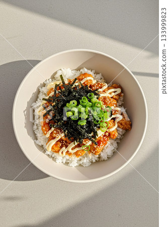 Korean Fried Chicken Rice Bowl with Seaweed and Scallions 133999823