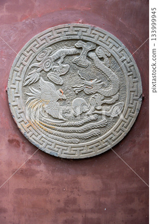 Craftsmanship showcased in a detailed stone carving in Chengdu Craftsmanship showcased in a detailed stone carving in Chengdu 133999945