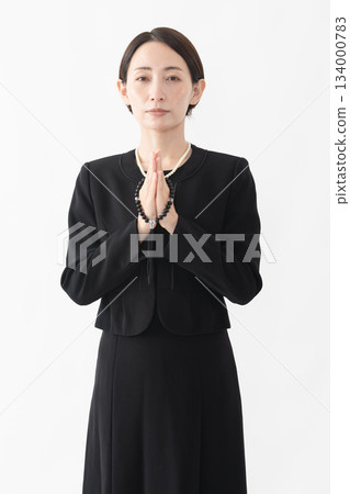 Woman in mourning clothes Funeral image Woman in mourning clothes Funeral image 134000783