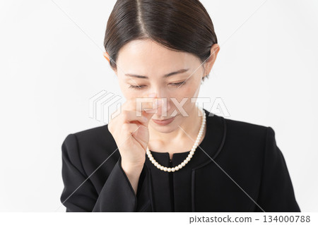 Woman in mourning clothes Funeral image 134000788