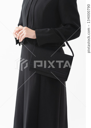 Woman in mourning clothes Funeral image Woman in mourning clothes Funeral image 134000790