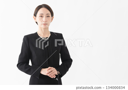 Woman in mourning clothes Funeral image 134000834