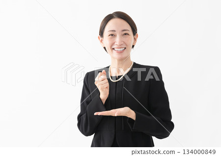 Woman in mourning clothes Funeral image 134000849
