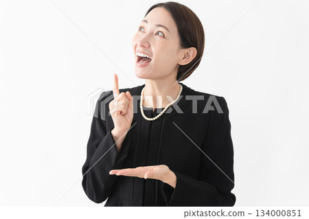 Woman in mourning clothes Funeral image 134000851