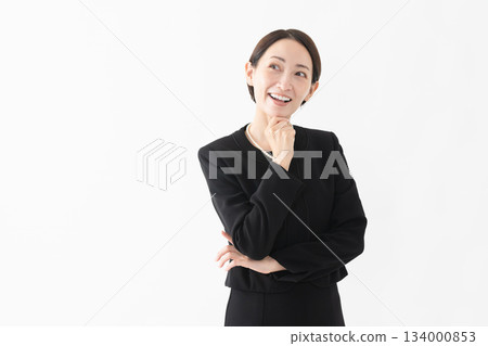 Woman in mourning clothes Funeral image 134000853