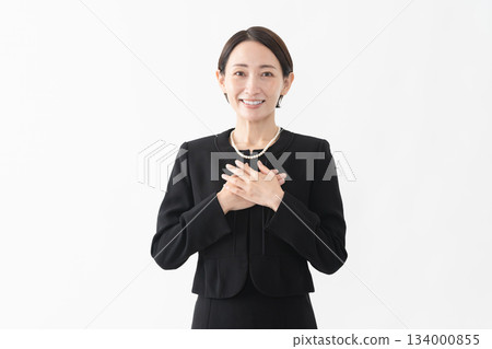 Woman in mourning clothes Funeral image 134000855