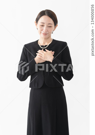 Woman in mourning clothes Funeral image Woman in mourning clothes Funeral image 134000856