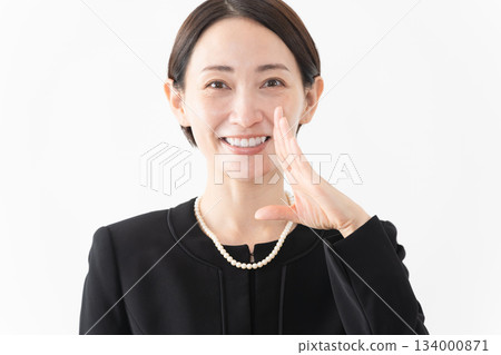Woman in mourning clothes Funeral image 134000871