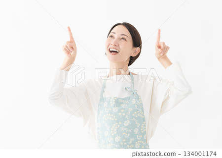 Woman wearing an apron Lifestyle image 134001174