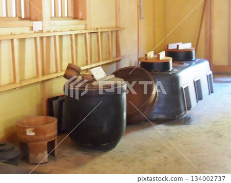 A hearth and kitchen utensils in an old house 134002737