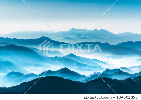 Mountain landscape shrouded in blue mist 134002853