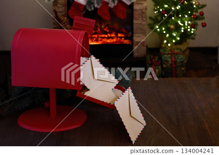 Santa Mailbox Holiday Scene. A festive red mailbox labeled 'Letters to Santa' with envelopes 134004241