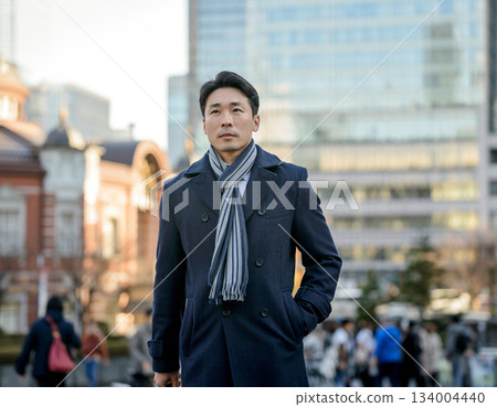 Commuting scene of Japanese businessmen going to work on a winter morning in a Japanese city 134004440