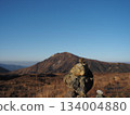 Stone piles standing in the grasslands of Mt. Aso in autumn 134004880