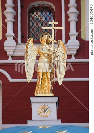 The Archangel Michael monument on Red Square in Moscow. It is part of a monument dedicated to the 850th anniversary of Moscow, erected in 1997. Archangel Michael is the patron saint of the city, and h 134005479