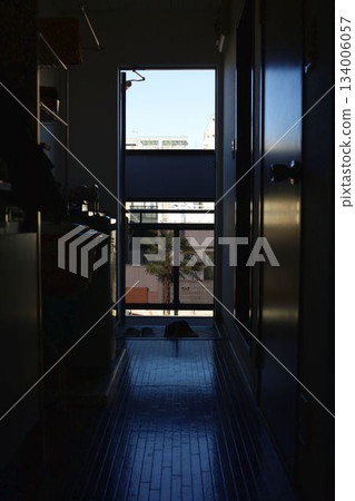 An open door to an empty room An open door to an empty room 134006057