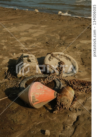 Worn Buoy Chain And Weathered Concrete Worn Buoy Chain And Weathered Concrete 134006085