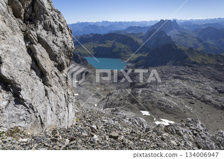 Hike to Schesaplana near Lunersee lake in Ratikon mountain range, Vorarlberg, Austria on a clear day Hike to Schesaplana near Lunersee lake in Ratikon mountain range, Vorarlberg, Austria on a clear day 134006947