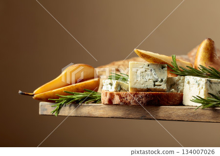 Sandwich with blue cheese, pears, and rosemary. Sandwich with blue cheese, pears, and rosemary. 134007026