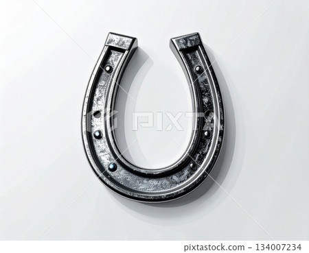 Metallic talisman. Metal horse shoe on white background. Horse is symbol of 2026. Symbol of lucky. Metallic talisman. Metal horse shoe on white background. Horse is symbol of 2026. Symbol of lucky. 134007234
