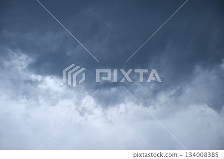 dark rain cloud floating on sky at sunset in evening dark rain cloud floating on sky at sunset in evening 134008385