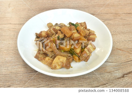 Stir fried slice fat pork belly with pineapple and black ear mushroom with soy sauce on plate Stir fried slice fat pork belly with pineapple and black ear mushroom with soy sauce on plate 134008588