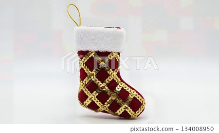 Sophisticated Gold Sequin Embellished Christmas Stocking Decoration Luxury Fabric Isolated Professional Product Photography Sophisticated Gold Sequin Embellished Christmas Stocking Decoration Luxury Fabric Isolated Professional Product Photography 134008950