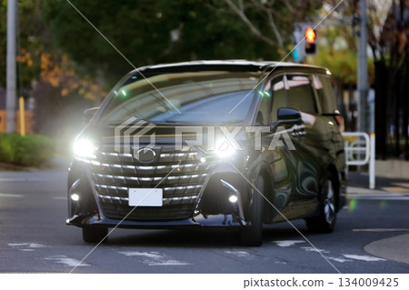 Image of a luxury black minivan Image of a luxury black minivan 134009425