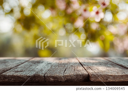 Spring background light bokeh with a wooden floor 134009545