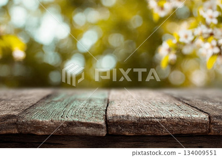 Spring background light bokeh with a wooden floor 134009551