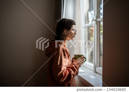 Outcast teen girl having social difficulties, problems in communication, spending time at home alone 134010685