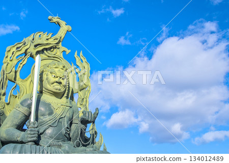 Naritasan Sendai Branch Temple: Japan's largest Acala Buddha statue shining against the blue sky Naritasan Sendai Branch Temple: Japan's largest Acala Buddha statue shining against the blue sky 134012489