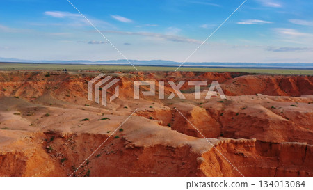 Bayanzag flaming cliffs at sunset in Mongolia Bayanzag flaming cliffs at sunset in Mongolia 134013084