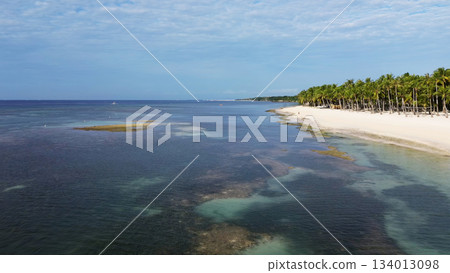Aerial view of beautiful tropical sandy beach Aerial view of beautiful tropical sandy beach 134013098