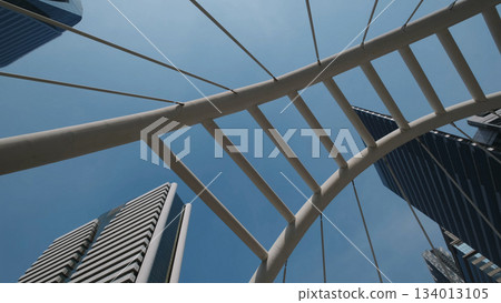 Walkway bridge arch and skyscrapers in Bangkok Walkway bridge arch and skyscrapers in Bangkok 134013105